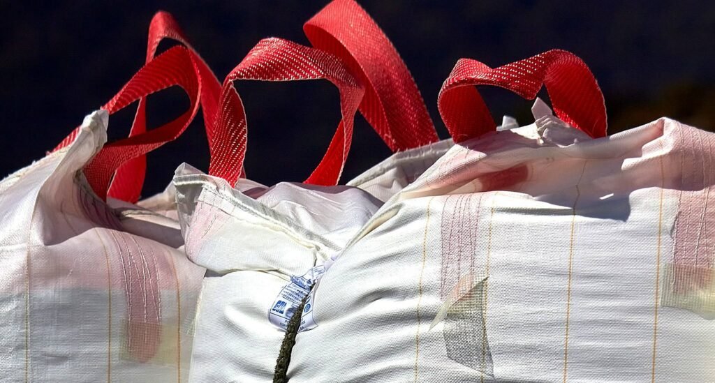 Skip bags with red handles