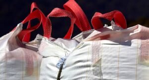 Skip bags with red handles